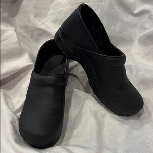Dansko Black leather Slip-On Clogs